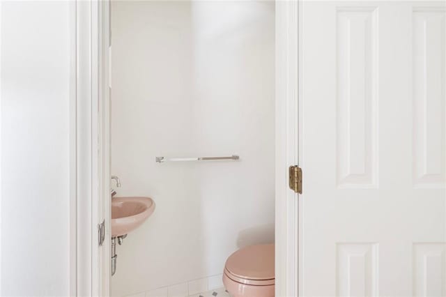 bathroom featuring toilet