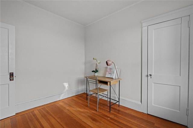 office area with crown molding and wood-type flooring