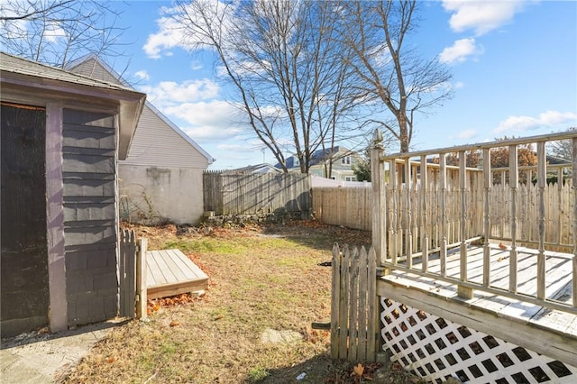 view of yard featuring a wooden deck