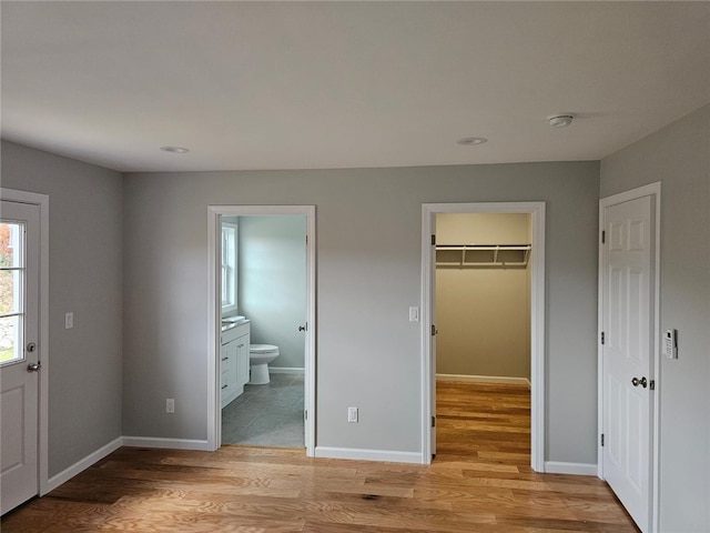 entryway with light hardwood / wood-style floors