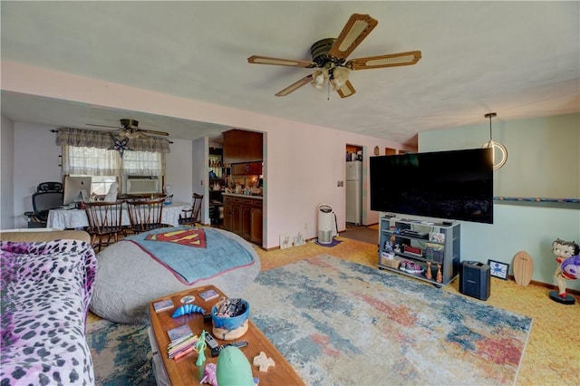 carpeted living room featuring ceiling fan