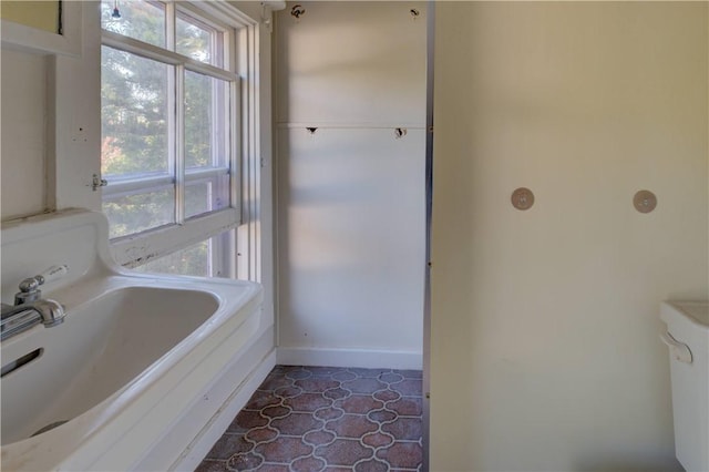 bathroom with tile patterned flooring