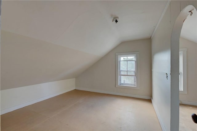 bonus room featuring vaulted ceiling