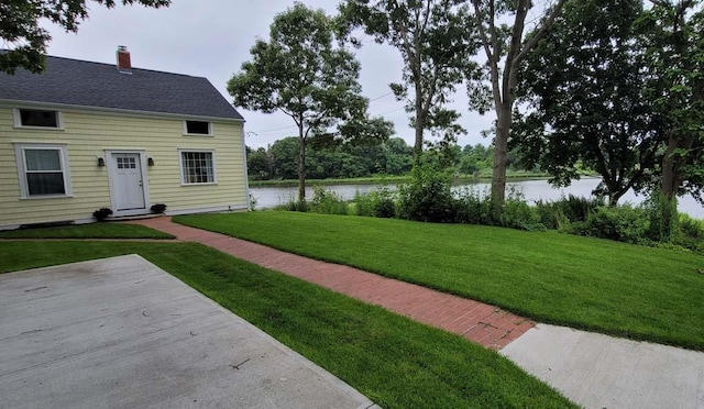 view of yard with a water view