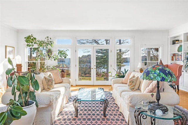 sunroom with french doors and a healthy amount of sunlight