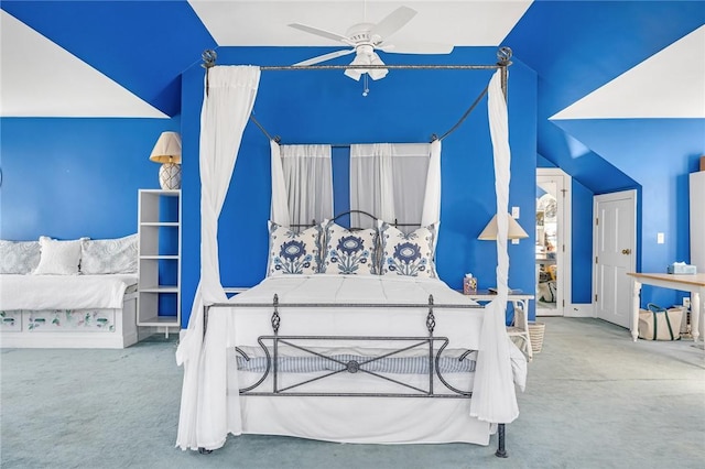 carpeted bedroom with ceiling fan and lofted ceiling