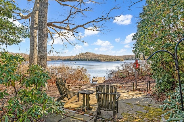 view of patio / terrace featuring a water view