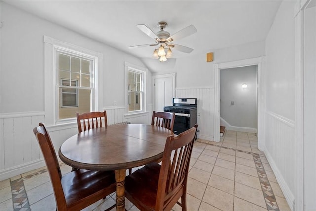 dining space featuring a wealth of natural light and ceiling fan