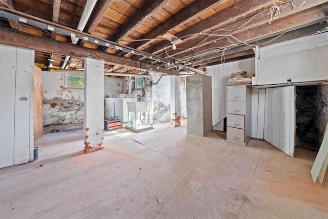 basement featuring washer and dryer