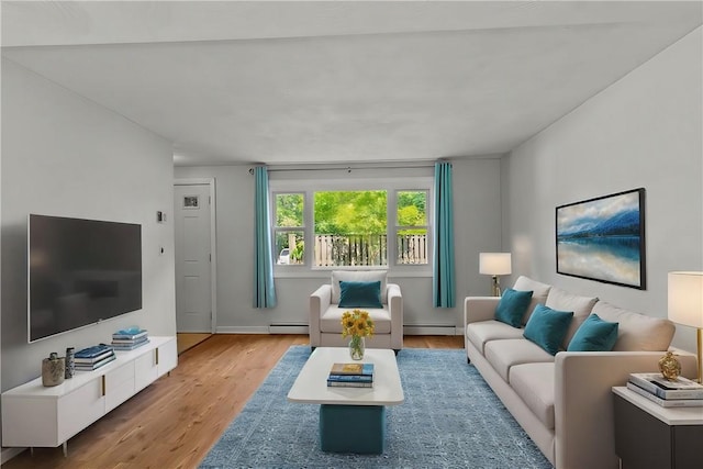 living room with light hardwood / wood-style floors and a baseboard heating unit