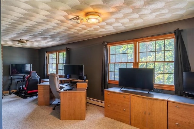 carpeted home office featuring a baseboard radiator