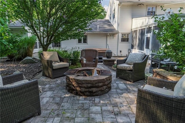 view of patio featuring a fire pit