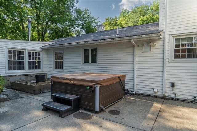 view of patio featuring a hot tub