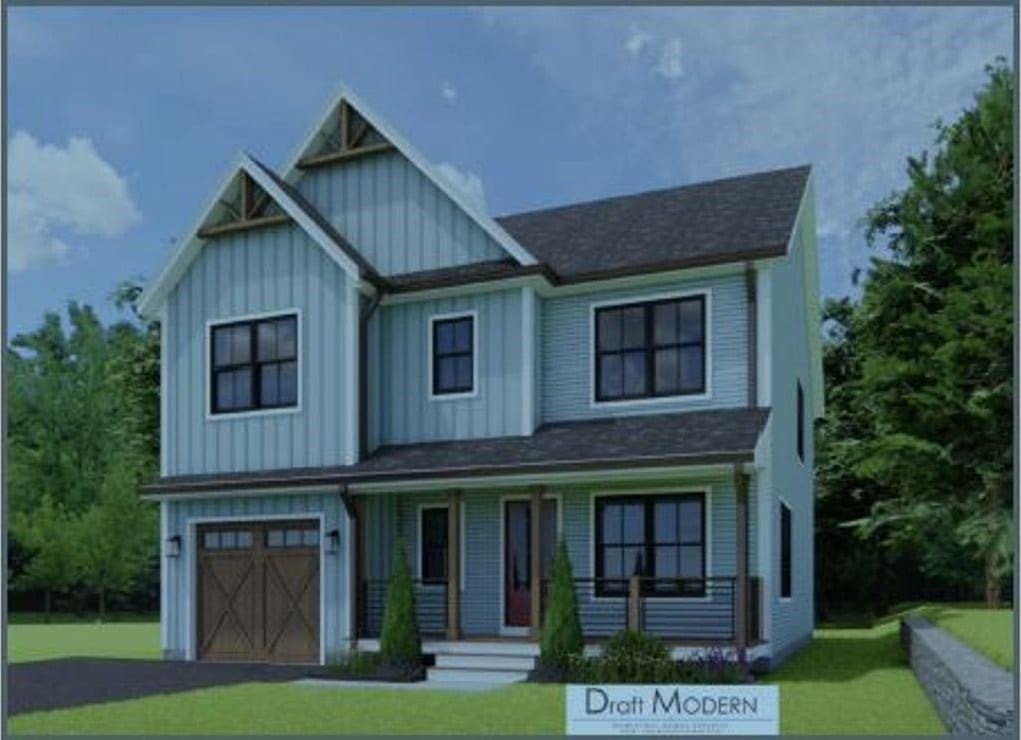 view of front facade with covered porch, a garage, and a front lawn