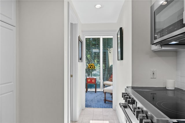 interior space with light tile patterned floors