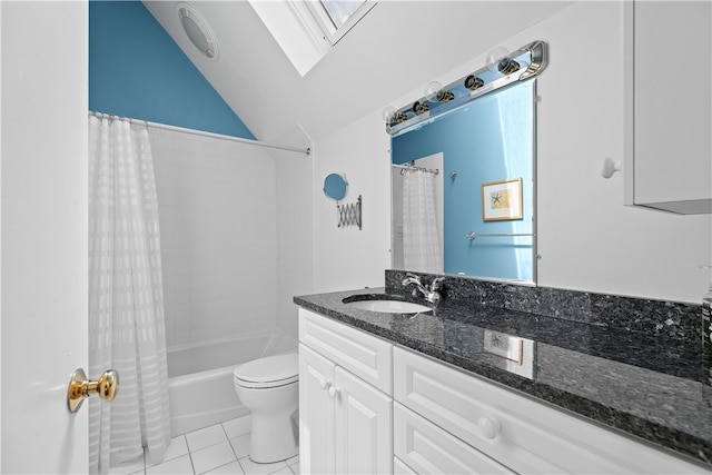 full bathroom featuring vanity, tile patterned floors, vaulted ceiling with skylight, toilet, and shower / bathtub combination with curtain