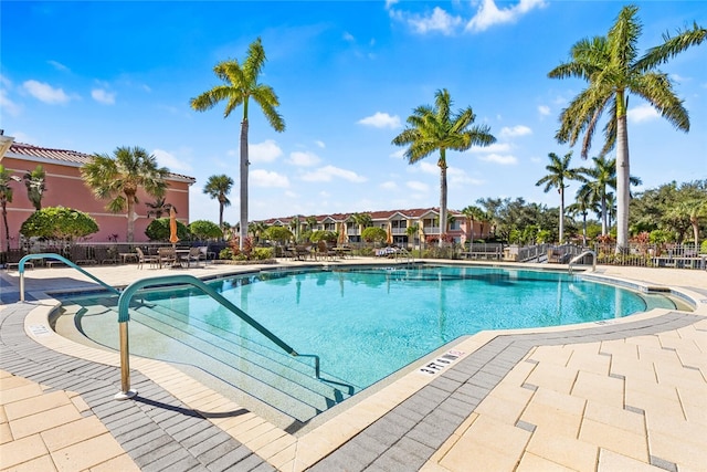 view of swimming pool featuring a patio area