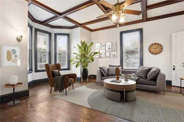 living room featuring wood-type flooring, a wealth of natural light, coffered ceiling, and ceiling fan