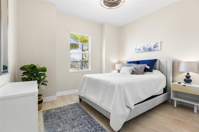 bedroom featuring hardwood / wood-style floors