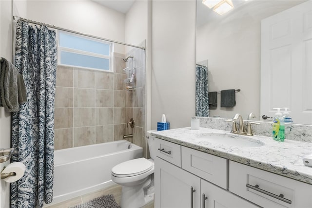 full bathroom featuring vanity, toilet, and shower / bath combo