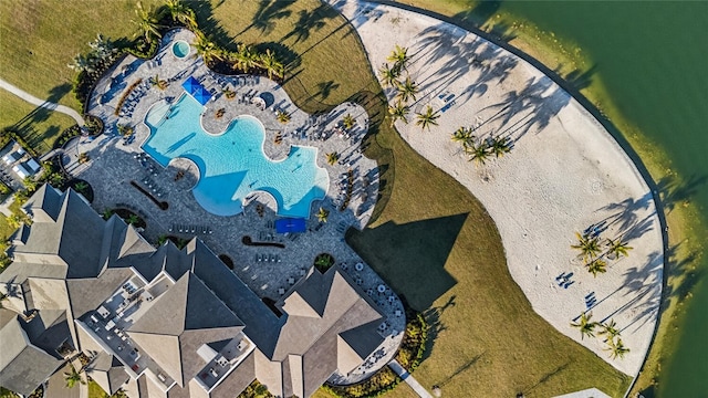 birds eye view of property featuring a water view