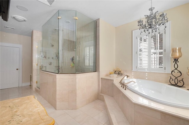 bathroom with tile patterned flooring, separate shower and tub, and a notable chandelier