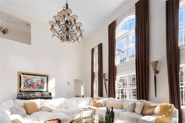 living room with a healthy amount of sunlight and an inviting chandelier