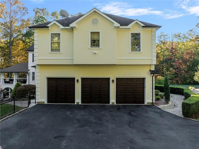 view of front of property featuring a garage