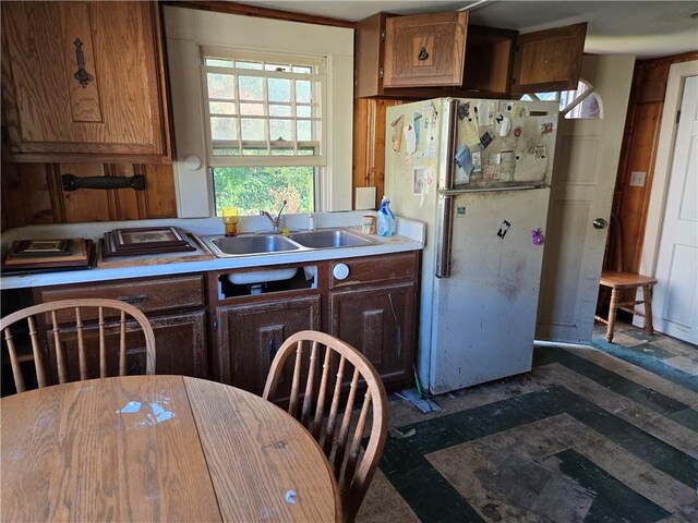 kitchen with white fridge and sink