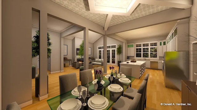 dining room with light wood-type flooring and lofted ceiling