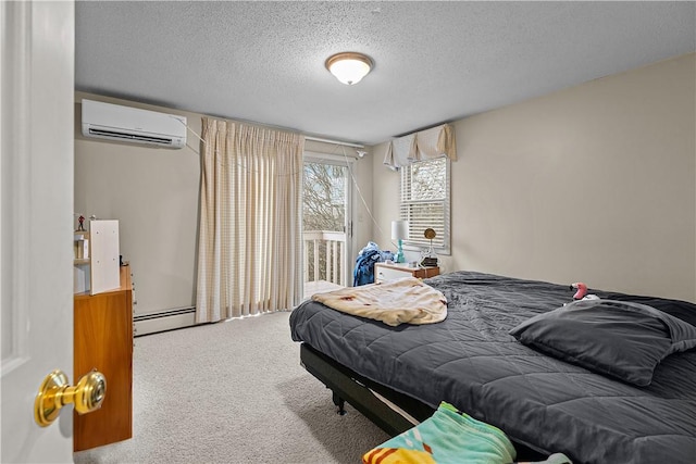 bedroom with carpet, a textured ceiling, a baseboard radiator, and a wall mounted AC