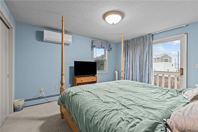 carpeted bedroom featuring a textured ceiling, a baseboard radiator, a wall unit AC, and a closet