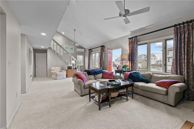 living room with ceiling fan, light colored carpet, a textured ceiling, and vaulted ceiling