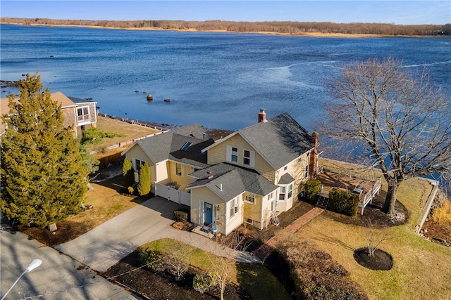 drone / aerial view with a water view