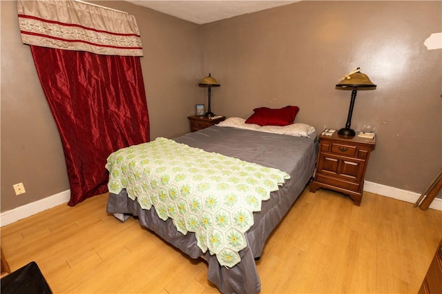 bedroom featuring light wood-type flooring