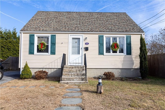 bungalow with a front lawn