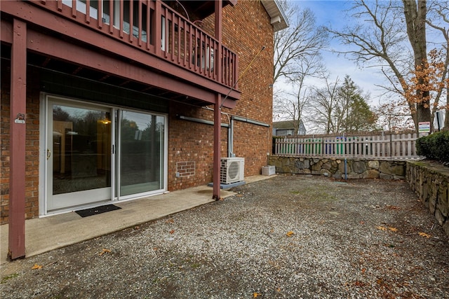 exterior space featuring ac unit and a patio