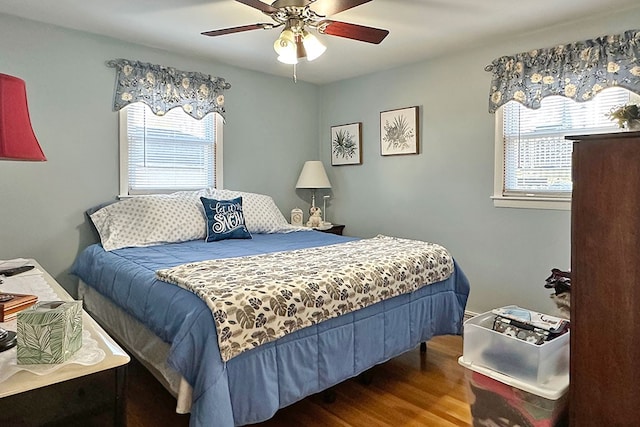 bedroom featuring hardwood / wood-style flooring and ceiling fan