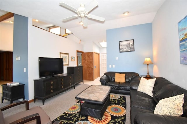 living room featuring ceiling fan, light colored carpet, and lofted ceiling