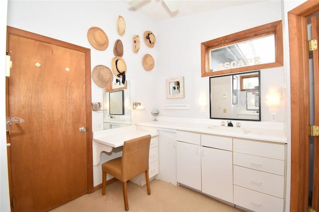 bathroom featuring vanity and ceiling fan