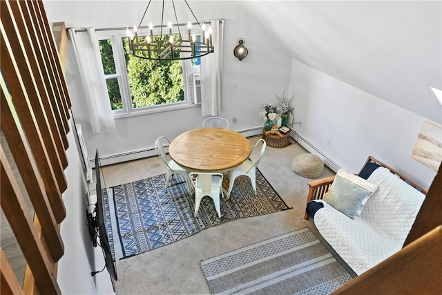 living area featuring carpet, an inviting chandelier, baseboard heating, and lofted ceiling