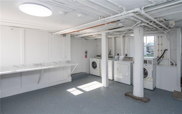 washroom featuring washer and dryer