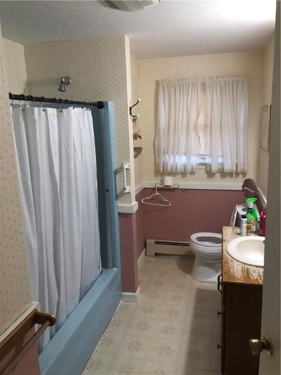 full bathroom with shower / bathtub combination with curtain, toilet, vanity, and a baseboard heating unit