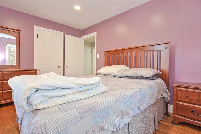 bedroom featuring light hardwood / wood-style floors