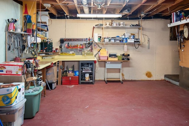 basement with a workshop area