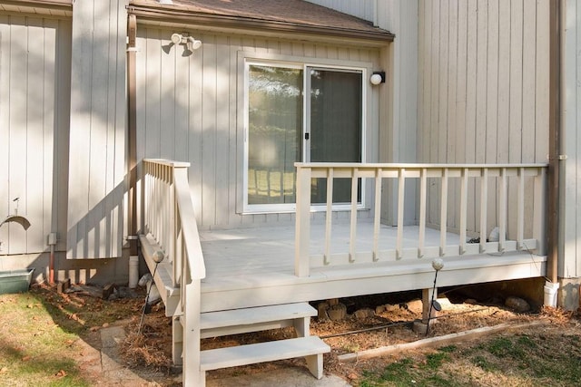 doorway to property featuring a wooden deck