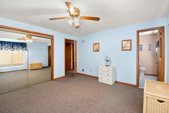 unfurnished bedroom with ceiling fan, a closet, carpet floors, and ensuite bathroom