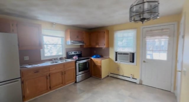 kitchen with stainless steel electric range, a baseboard heating unit, cooling unit, white refrigerator, and extractor fan