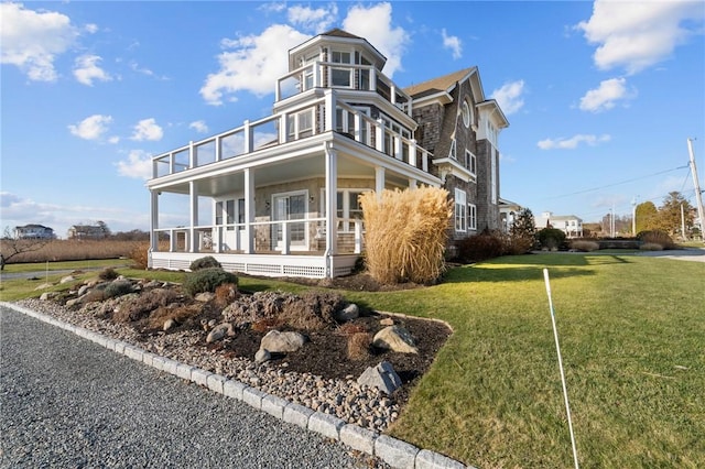 view of front of property with a front lawn