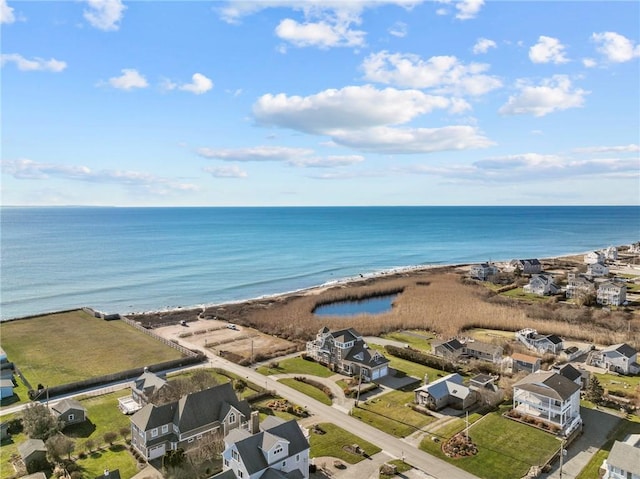 aerial view featuring a view of the beach and a water view